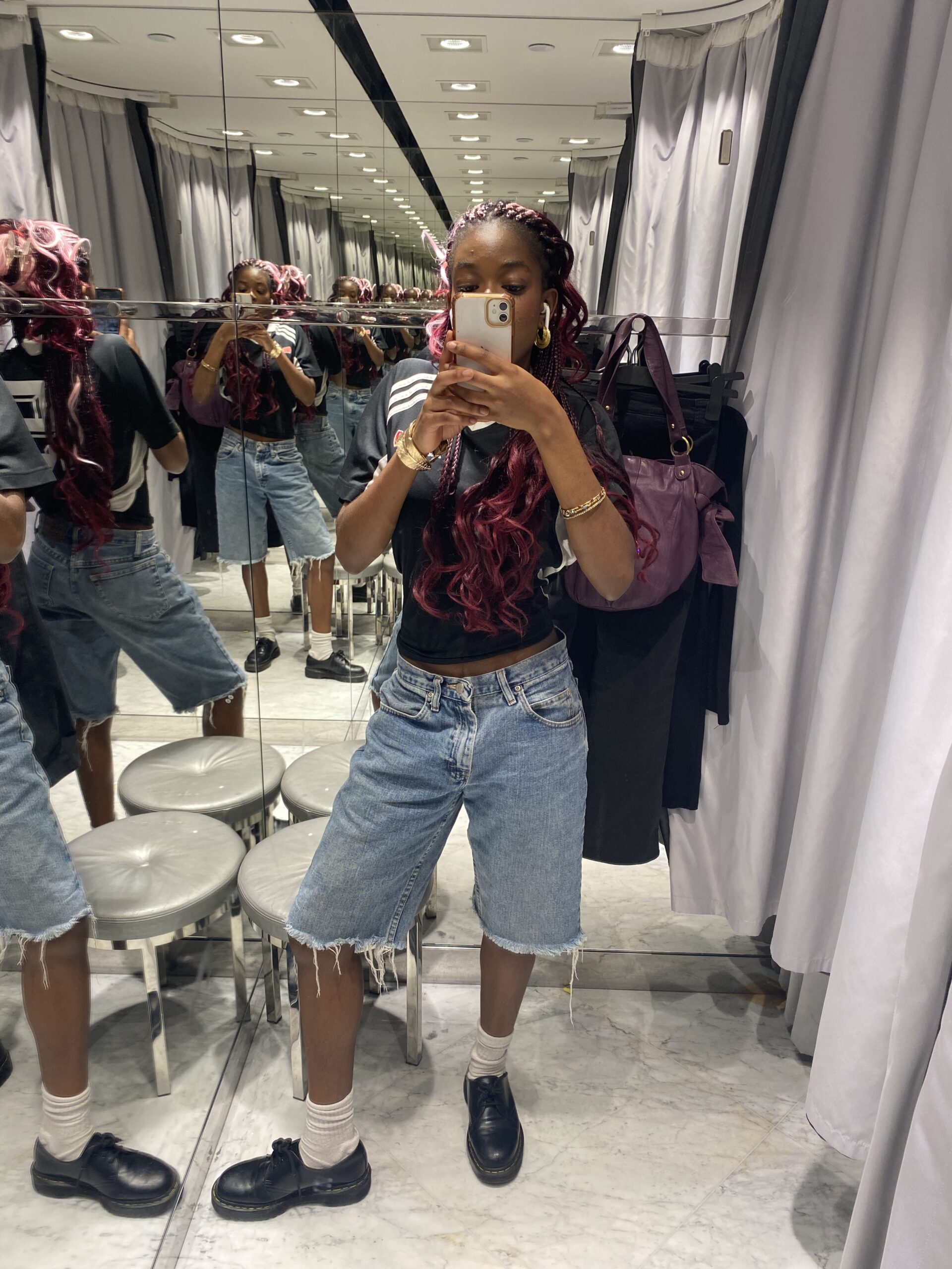 How to actually develop your personal style part 2 Casual streetwear look featuring denim jorts, Doc Martens with socks, and a black football jersey