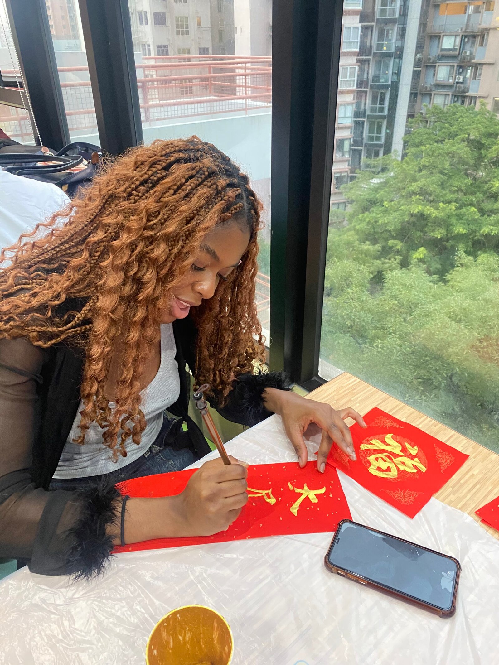 International student painting traditional Chinese New Year artwork at a University of Hong Kong (HKU) cultural event — introducing my blog about student life, creativity, and cultural experiences abroad