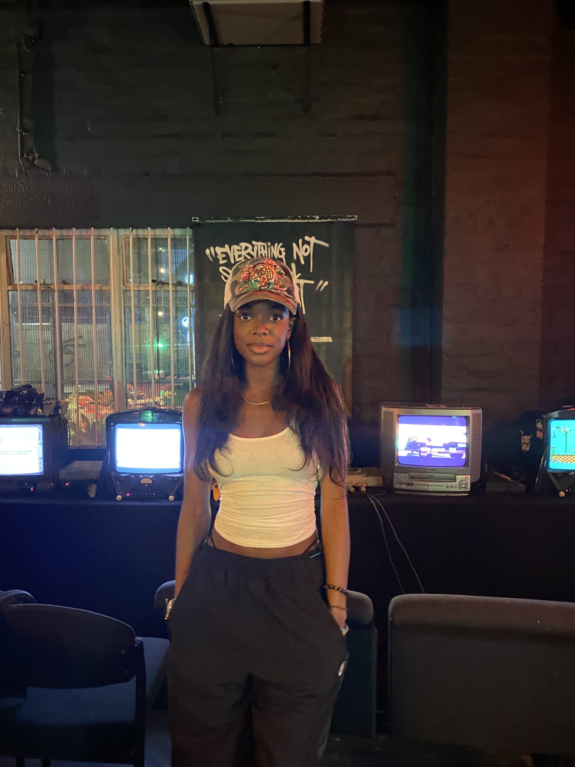 How to actually develop your personal style part 2 “Streetwear outfit featuring a white crop top, Nike joggers, and an Ed Hardy cap showcasing my casual street fashion style.”