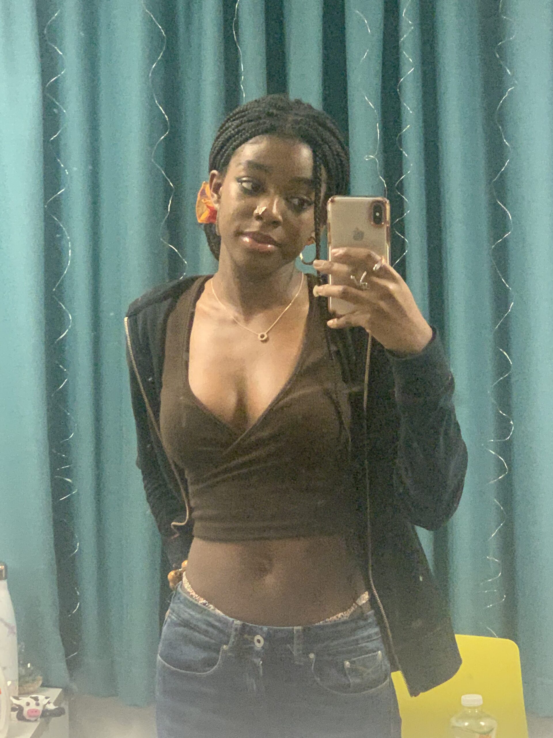 How to actually develop your personal style part 2 Y2K-inspired outfit featuring a brown cropped wrap top, flare jeans, and a black open zip hoodie as part of my fashion journey